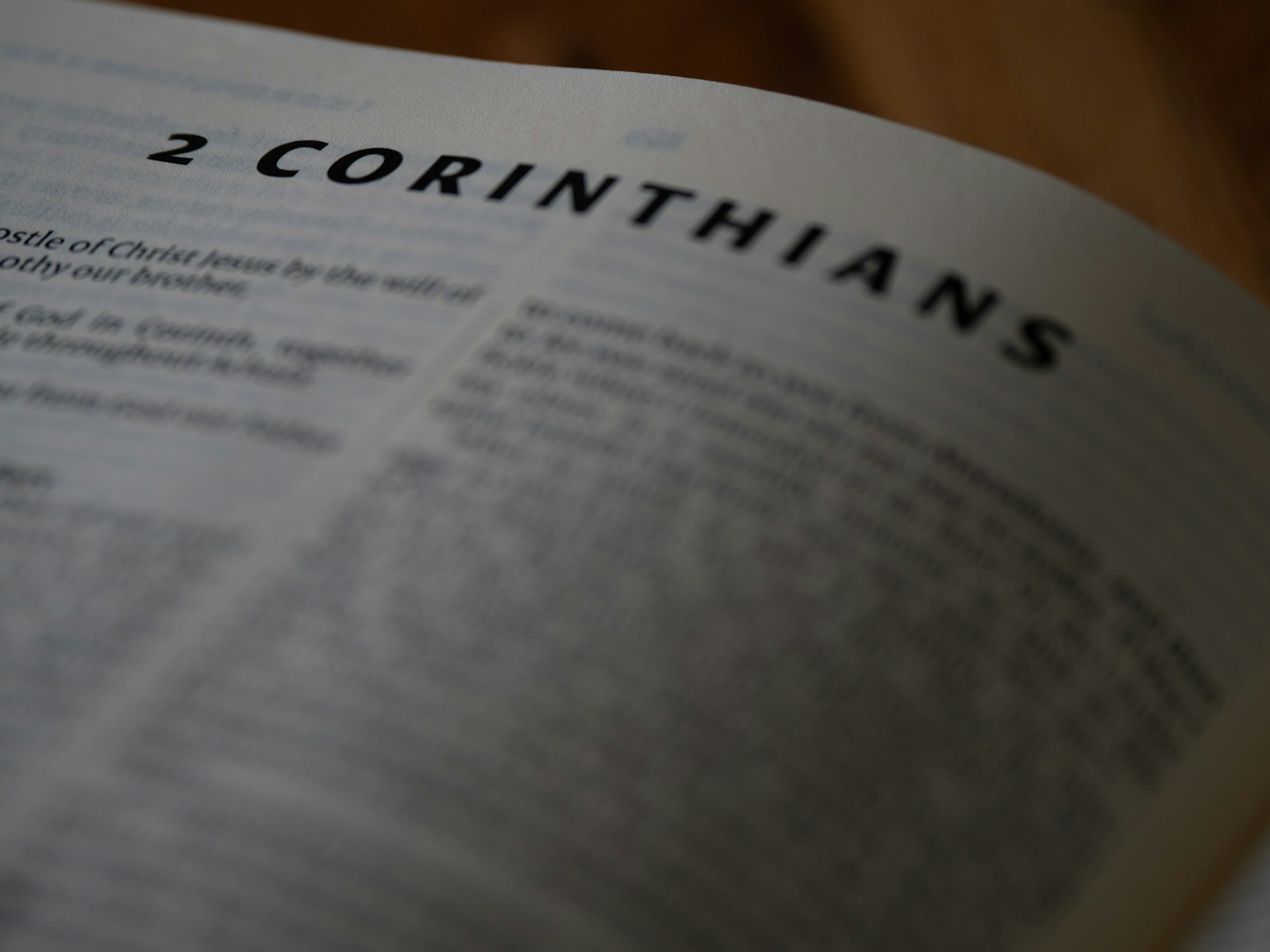 A close up of a book with the word 2 corinthians on it